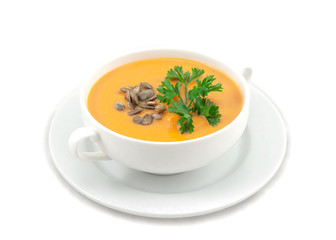 Pumpkin soup with pumpkin seeds and parsley