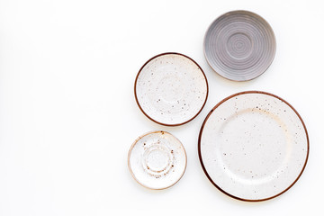 Mockup with plates. Empty ceramic plates on white background top view space for text