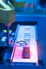 robotic screen protector film or glass cover in manufacture phone factory