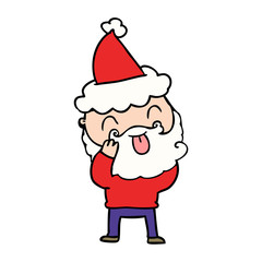 man with beard sticking out tongue wearing santa hat