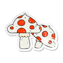distressed sticker of a quirky hand drawn cartoon toadstools