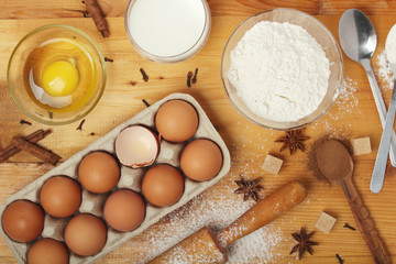 Food ingredients for baking: flour, eggs, milk, sugar