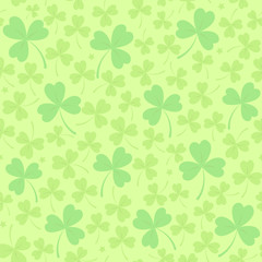 Saint Patrick's day seamless background in light green with cloverleafs and stars. Shamrock irish background. For web, textile, wrapping paper, wallpaper, banner, card. Vector illustration.