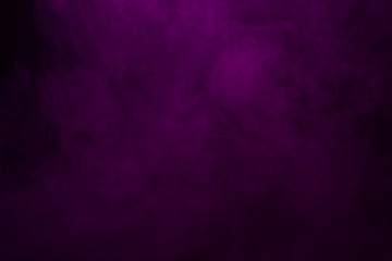 Colorful smoke close-up on a black background
