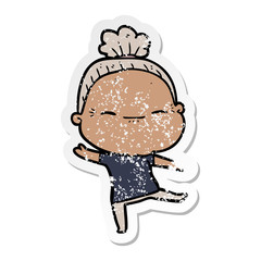distressed sticker of a cartoon peaceful old woman