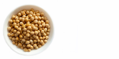 Garbanzo Bean. Raw dry chickpeas in white bowl on white background.