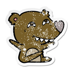 distressed sticker of a cartoon bear showing teeth