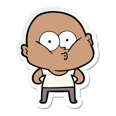 sticker of a cartoon bald man staring