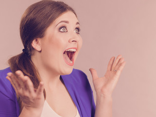 Shocked amazed woman gesturing with hands