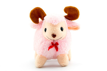 Stuffed pink sheep doll isolated on white background.