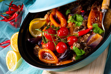 Tasty spicy beef with various vegetables cooked in tagine