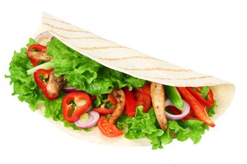 Tortilla wrap with fried chicken meat and vegetables isolated on white background. fast food