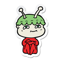 sticker of a friendly cartoon spaceman