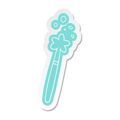 cartoon sticker of a magic wand