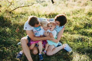 Happy Young  Family have a good time In The Park