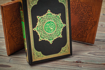 Fototapeta premium Koran holy book of Muslims, public item of all muslims on the table , still life
