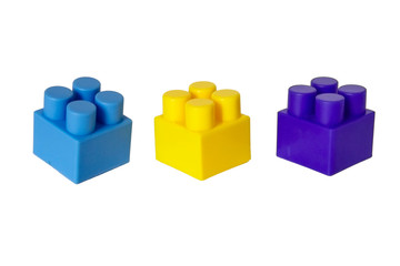 Naklejka premium details of a children's plastic constructor on a white background. colored cubes. block.
