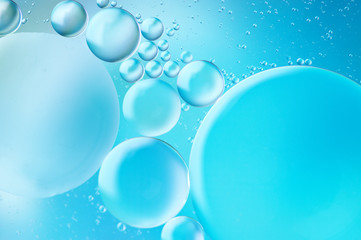 Blue colored abstract background with bubbles