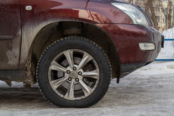 dirty car wheel and fender 