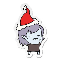 sticker cartoon of a undead vampire girl wearing santa hat