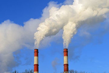 Stream of smoke from the chimney of a factory