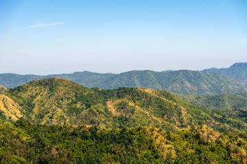 Mountain view with sky background.