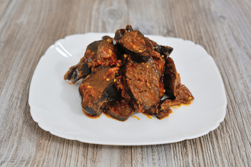 Pickled stuffed eggplant with vegetables