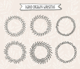 Hand drawn wreaths, sketch frames on a vintage floral background