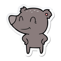 sticker of a friendly bear with hands on hips