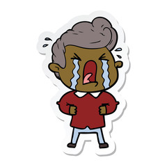 sticker of a cartoon crying man