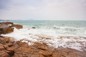 Waves crashing on rocks at coast