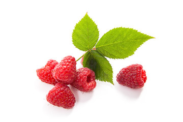 Ripe raspberries with leaf isolated on white background.