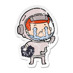 distressed sticker of a cartoon crying astronaut