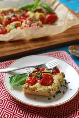 Plate with tasty Italian focaccia on table