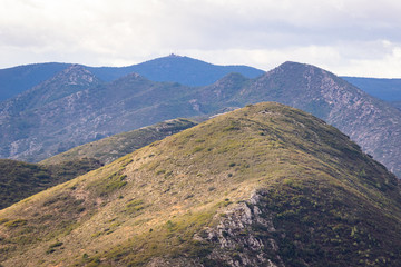 Panoramic view of mountains in Spain. Cloudy sky.