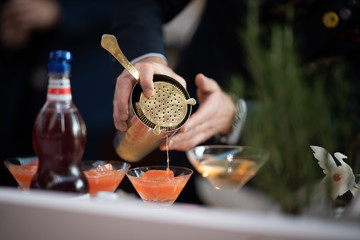 bartender making cocktail 