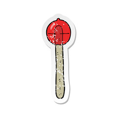 retro distressed sticker of a cartoon lollipop