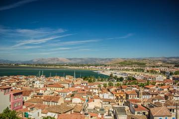 Fototapeta na wymiar aerial city photography of old medieval town with small port sea bay