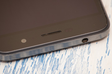Smartphone close-up, macro. There is a place for text.
