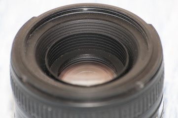 Close-up, macro, camera lens, view from the top. Concept business cards, design, photographer...