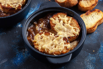 Delicious onion soup with croutons and cheese