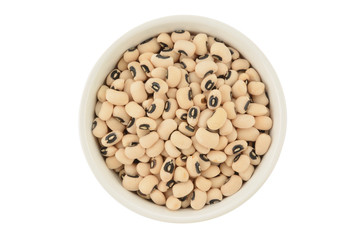 Alubia carilla en un bol de cerámica blanca, top view