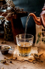 Pouring Herbal Tea