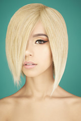 Lovely asian woman with blonde short hair