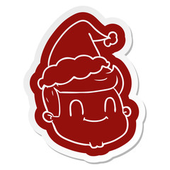 cartoon  sticker of a male face wearing santa hat