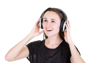 singing young woman with headphones listnening to music