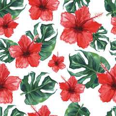 Seamless pattern with monstera leaves and hibiscus flowers. Watercolor illustration.