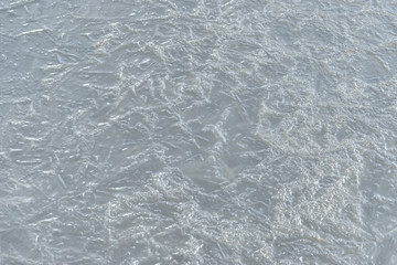 River ice texture close up. Winter background
