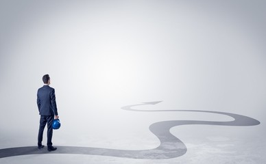 Man with object in his hand on the direct way to success