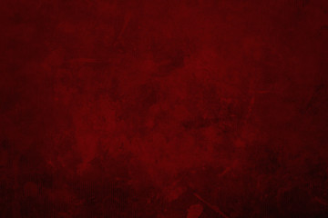 Dark red grungy canvas background or texture